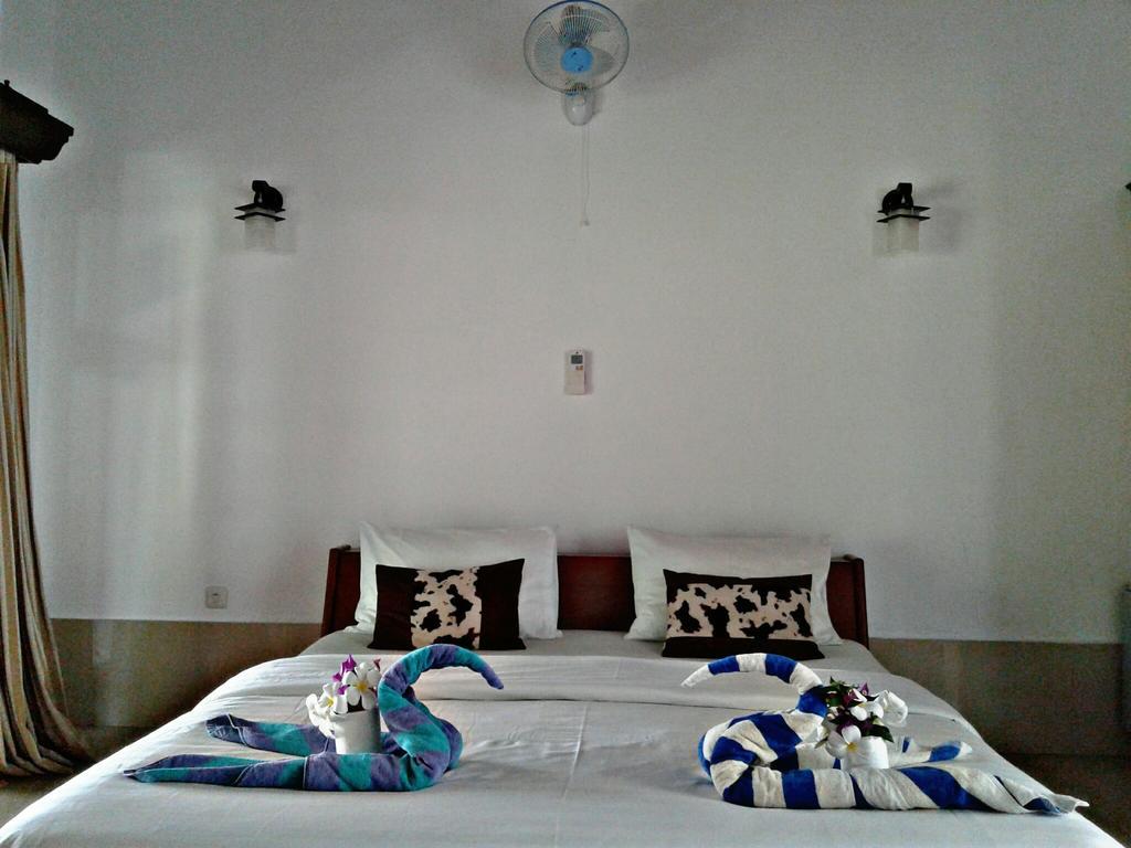 Malino Homestay Gili Trawangan Buitenkant foto